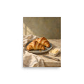 Golden Morning Croissants matte poster, 12 × 16 inches, showing golden croissants, butter and a blue ceramic plate
